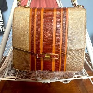 Brahmin Leather Bag with Front Flap Latch.